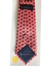 Load image into Gallery viewer, Back of the custom designed pink silk tie by Pelican Coast depicted on white gift box with gold colored seal.