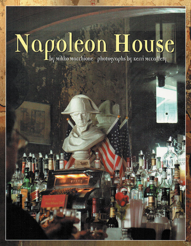 Book cover shows historic Napoleon House bar with a small Napoleon statue overlooking bar patrons with mirror in the background.